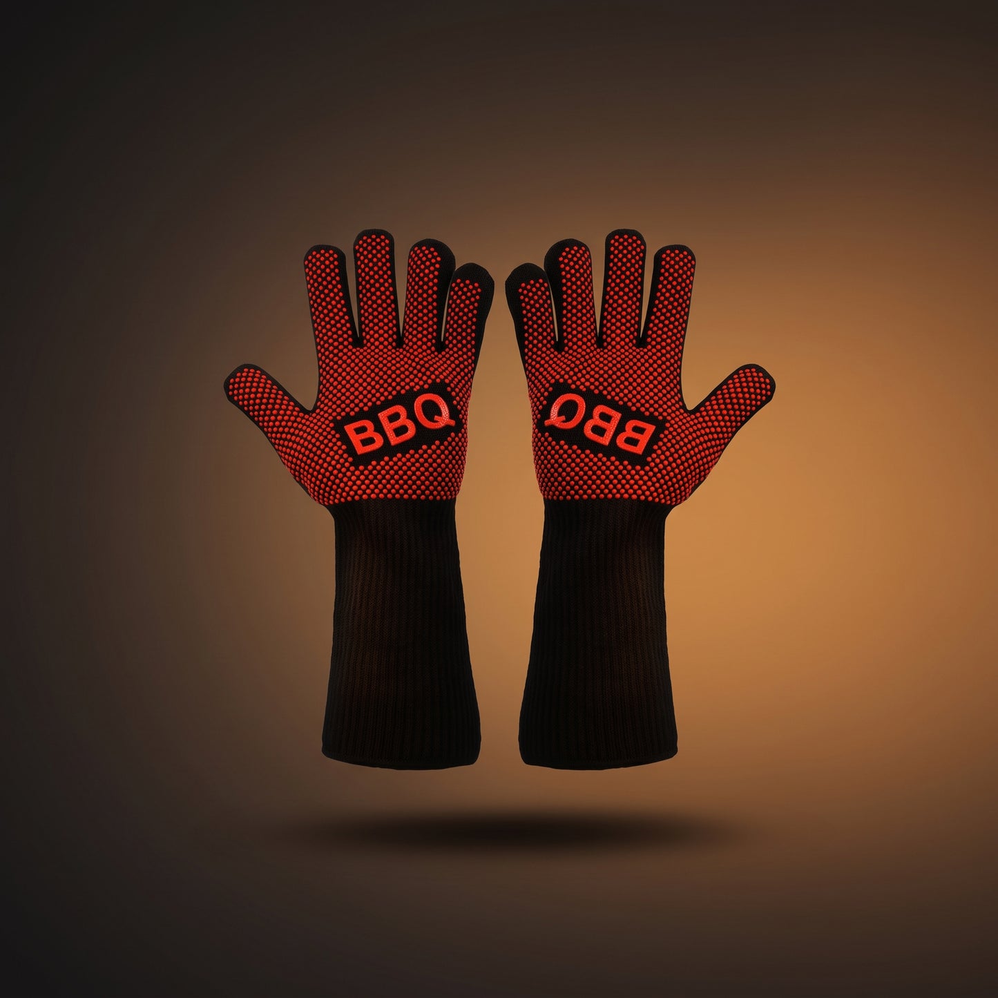 Pair of red and black heat resistant BBQ grilling gloves