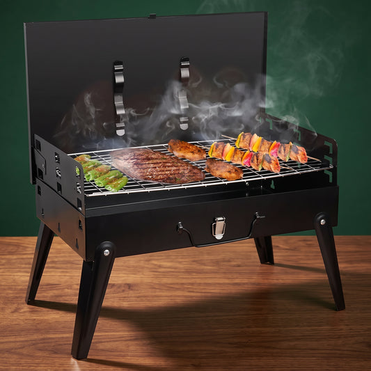 The Briefcase fold-out charcoal grill on a walnut table, Big Ron BBQ catalog
