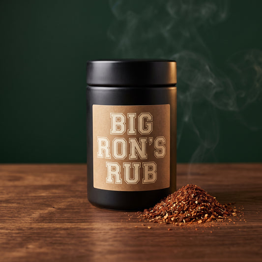 Big Ron's Rub small batch BBQ spice rub jar on a walnut table